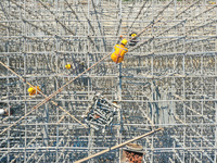 Workers are working at the construction site of the Xuancheng-Hangzhou Railway interchange in Huzhou, China, on November 22, 2023. (