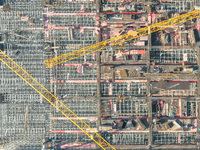 Workers are working at the construction site of the Xuancheng-Hangzhou Railway interchange in Huzhou, China, on November 22, 2023. (