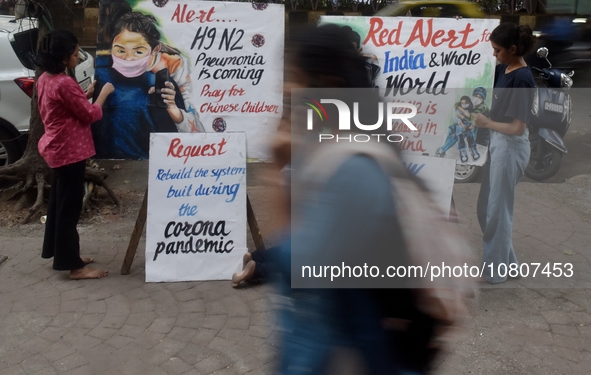 Students are painting posters as part of an awareness campaign for the ongoing H9N2 Virus in Mumbai, India, on November 25, 2025. 