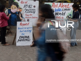 Students are painting posters as part of an awareness campaign for the ongoing H9N2 Virus in Mumbai, India, on November 25, 2025. (