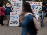 Students are painting posters as part of an awareness campaign for the ongoing H9N2 Virus in Mumbai, India, on November 25, 2025. (