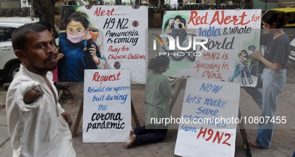 Students are painting posters as part of an awareness campaign for the ongoing H9N2 Virus in Mumbai, India, on November 25, 2025. 