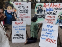 Students are painting posters as part of an awareness campaign for the ongoing H9N2 Virus in Mumbai, India, on November 25, 2025. (