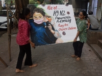 Students are painting posters as part of an awareness campaign for the ongoing H9N2 Virus in Mumbai, India, on November 25, 2025. (