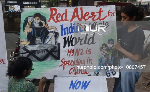 Students are painting posters as part of an awareness campaign for the ongoing H9N2 Virus in Mumbai, India, on November 25, 2025. 