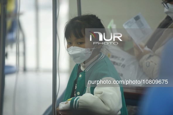 A child is receiving an infusion at Hangzhou First People's Hospital in Hangzhou, Zhejiang province, China, on November 26, 2023. 