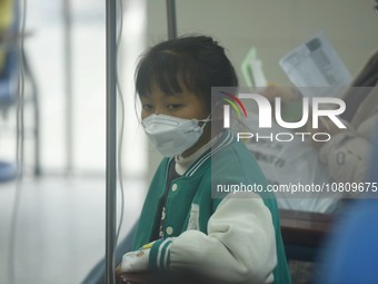 A child is receiving an infusion at Hangzhou First People's Hospital in Hangzhou, Zhejiang province, China, on November 26, 2023. (