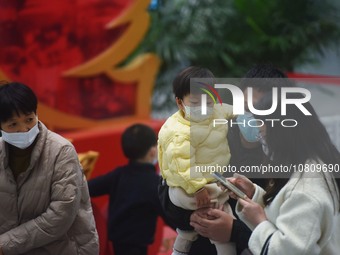 A nurse is preparing an infusion for a child in the infusion area of Hangzhou First People's Hospital in Hangzhou, Zhejiang province, China,...