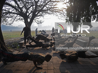 Indian army soldiers are exercising on the ground on a smoggy morning amid rising air pollution levels in Kolkata, India, on November 27, 20...