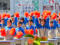 Students are performing desk exercises at the Third Nationalities Middle School in Congjiang County, Guizhou Province, southwest China, on N...