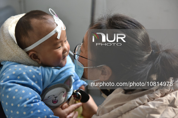 A 7-month-old baby is receiving infusion treatment at the Department of Pediatrics of the People's Hospital in Fuyang, Anhui province, China...