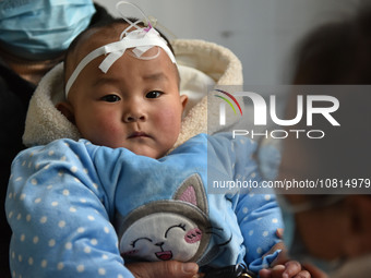 A 7-month-old baby is receiving infusion treatment at the Department of Pediatrics of the People's Hospital in Fuyang, Anhui province, China...