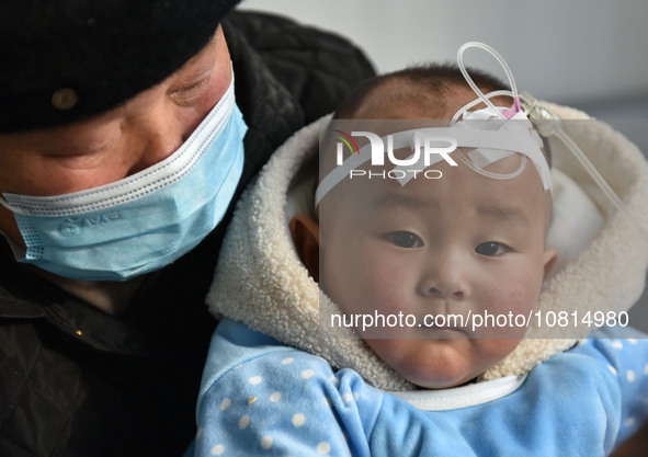 A 7-month-old baby is receiving infusion treatment at the Department of Pediatrics of the People's Hospital in Fuyang, Anhui province, China...