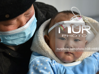 A 7-month-old baby is receiving infusion treatment at the Department of Pediatrics of the People's Hospital in Fuyang, Anhui province, China...