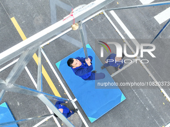 Firefighters are conducting a fire drill at the Qianyuan fire prevention and rescue station in Deqing County, Huzhou City, Zhejiang Province...