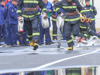 Firefighters are conducting a fire drill at the Qianyuan fire prevention and rescue station in Deqing County, Huzhou City, Zhejiang Province...