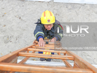 Firefighters are conducting a fire drill at the Qianyuan fire prevention and rescue station in Deqing County, Huzhou City, Zhejiang Province...