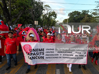 CANCUN, MEXICO - DECEMBER 1, 2023: 
Activists during the World AIDS Day March seen in the center of Cancun, on December 1st, 2023, in Cancun...