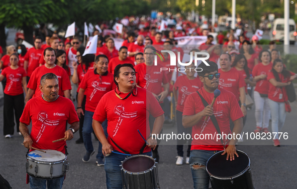 CANCUN, MEXICO - DECEMBER 1, 2023: 
Activists during the World AIDS Day March seen in the center of Cancun, on December 1st, 2023, in Cancun...