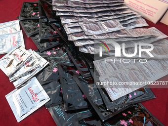 CANCUN, MEXICO - DECEMBER 1, 2023: 
A stand with free contraception prducts offered to participants of the World AIDS Day March in Cancun, o...