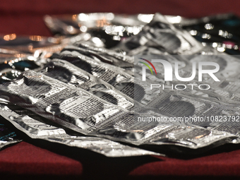 CANCUN, MEXICO - DECEMBER 1, 2023: 
A stand with free contraception prducts offered to participants of the World AIDS Day March in Cancun, o...