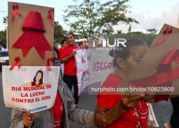 CANCUN, MEXICO - DECEMBER 1, 2023: 
Activists during the World AIDS Day March seen in the center of Cancun, on December 1st, 2023, in Cancun...