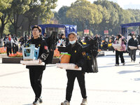 Candidates are walking into a test room to take the Jiangsu Provincial Unified Examination for Fine Arts and Art Design at the test center o...