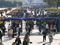 Candidates for the Jiangsu Provincial Unified Examination of Fine Arts and Art Design are passing through the intelligent security gate at t...