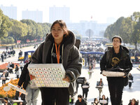 Candidates are walking into a test room to take the Jiangsu Provincial Unified Examination for Fine Arts and Art Design at the test center o...