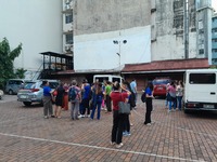 Officr Workers And Studentd Stand Outside After An Earthquake Was Felt In Manila, Philippines On December 5, 2023. A Magnitude 5.9 Earthquak...