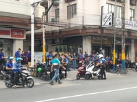 Officr Workers And Studentd Stand Outside After An Earthquake Was Felt In Manila, Philippines On December 5, 2023. A Magnitude 5.9 Earthquak...