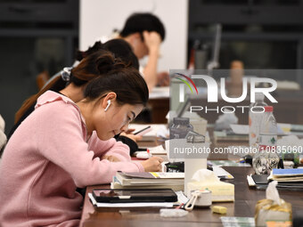 College students are reviewing for exams at the library of Nanjing Forestry University in Nanjing, China, on December 7, 2023. (