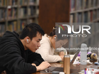 College students are reviewing for exams at the library of Nanjing Forestry University in Nanjing, China, on December 7, 2023. (