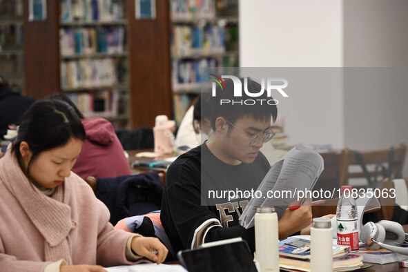 College students are reviewing for exams at the library of Nanjing Forestry University in Nanjing, China, on December 7, 2023. 