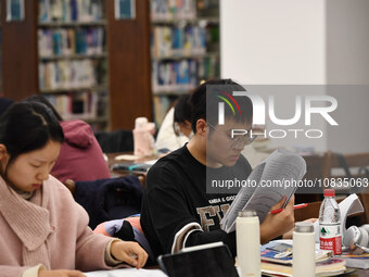 College students are reviewing for exams at the library of Nanjing Forestry University in Nanjing, China, on December 7, 2023. (