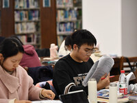 College students are reviewing for exams at the library of Nanjing Forestry University in Nanjing, China, on December 7, 2023. (