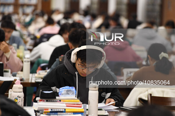 College students are reviewing for exams at the library of Nanjing Forestry University in Nanjing, China, on December 7, 2023. 