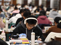 College students are reviewing for exams at the library of Nanjing Forestry University in Nanjing, China, on December 7, 2023. (