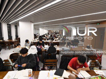 College students are reviewing for exams at the library of Nanjing Forestry University in Nanjing, China, on December 7, 2023. (