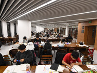 College students are reviewing for exams at the library of Nanjing Forestry University in Nanjing, China, on December 7, 2023. (