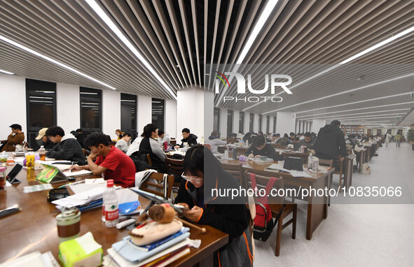 College students are reviewing for exams at the library of Nanjing Forestry University in Nanjing, China, on December 7, 2023. 