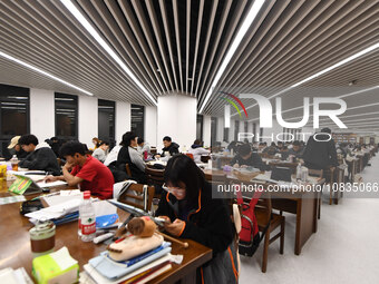 College students are reviewing for exams at the library of Nanjing Forestry University in Nanjing, China, on December 7, 2023. (