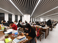 College students are reviewing for exams at the library of Nanjing Forestry University in Nanjing, China, on December 7, 2023. (