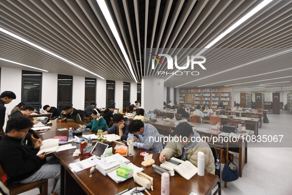 College students are reviewing for exams at the library of Nanjing Forestry University in Nanjing, China, on December 7, 2023. 