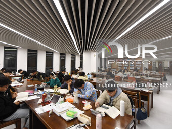 College students are reviewing for exams at the library of Nanjing Forestry University in Nanjing, China, on December 7, 2023. (