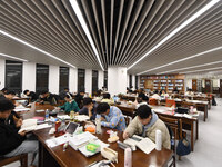 College students are reviewing for exams at the library of Nanjing Forestry University in Nanjing, China, on December 7, 2023. (