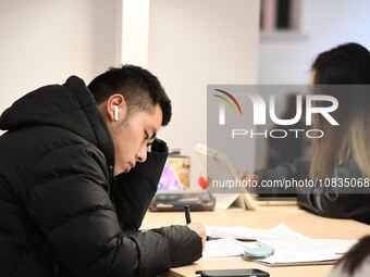 College students are reviewing for exams at the library of Nanjing Forestry University in Nanjing, China, on December 7, 2023. (