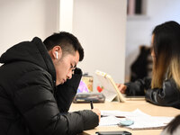 College students are reviewing for exams at the library of Nanjing Forestry University in Nanjing, China, on December 7, 2023. (