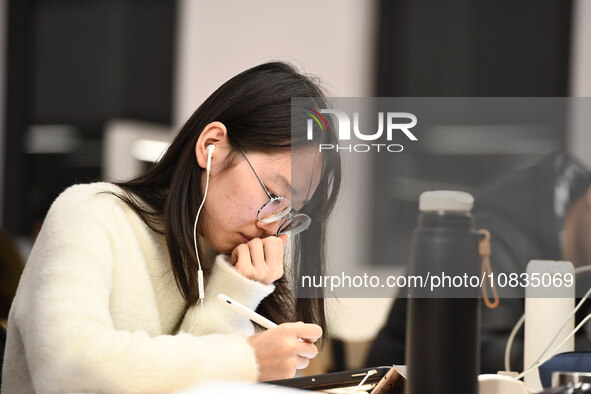 College students are reviewing for exams at the library of Nanjing Forestry University in Nanjing, China, on December 7, 2023. 