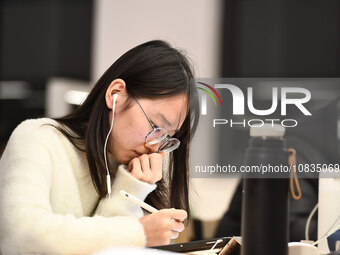 College students are reviewing for exams at the library of Nanjing Forestry University in Nanjing, China, on December 7, 2023. (